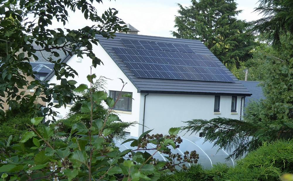 Completed roof with solar panels. Jubilee House